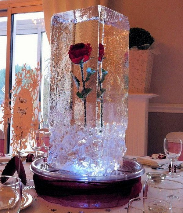 frozen rose as a winter wedding centerpieces