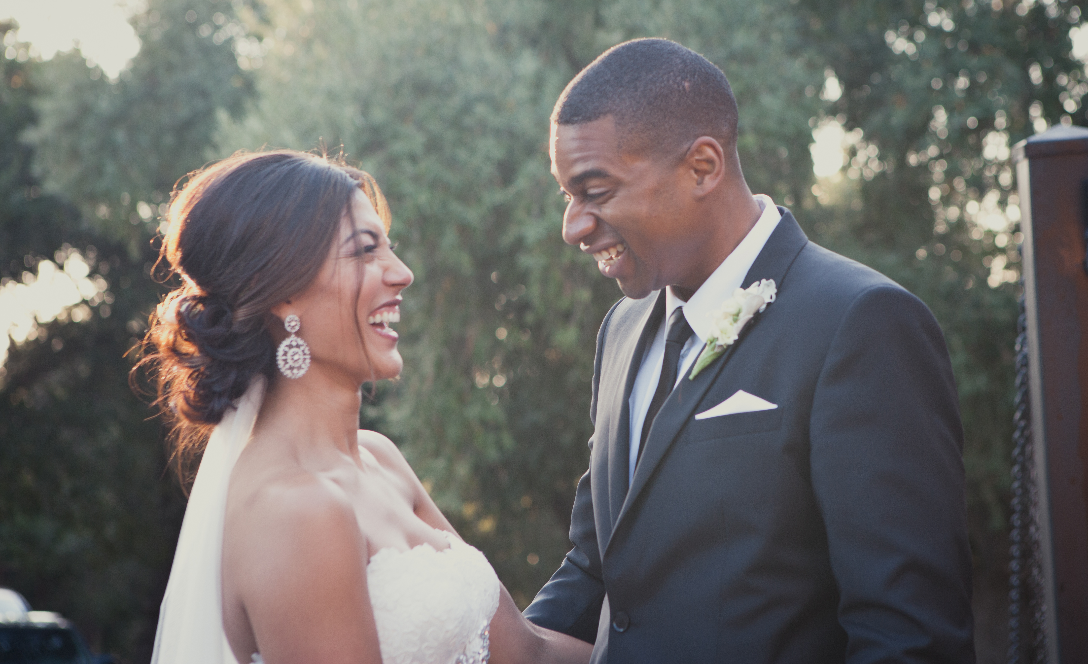 Wedding Traditions - Bride And Groom Laughing Together